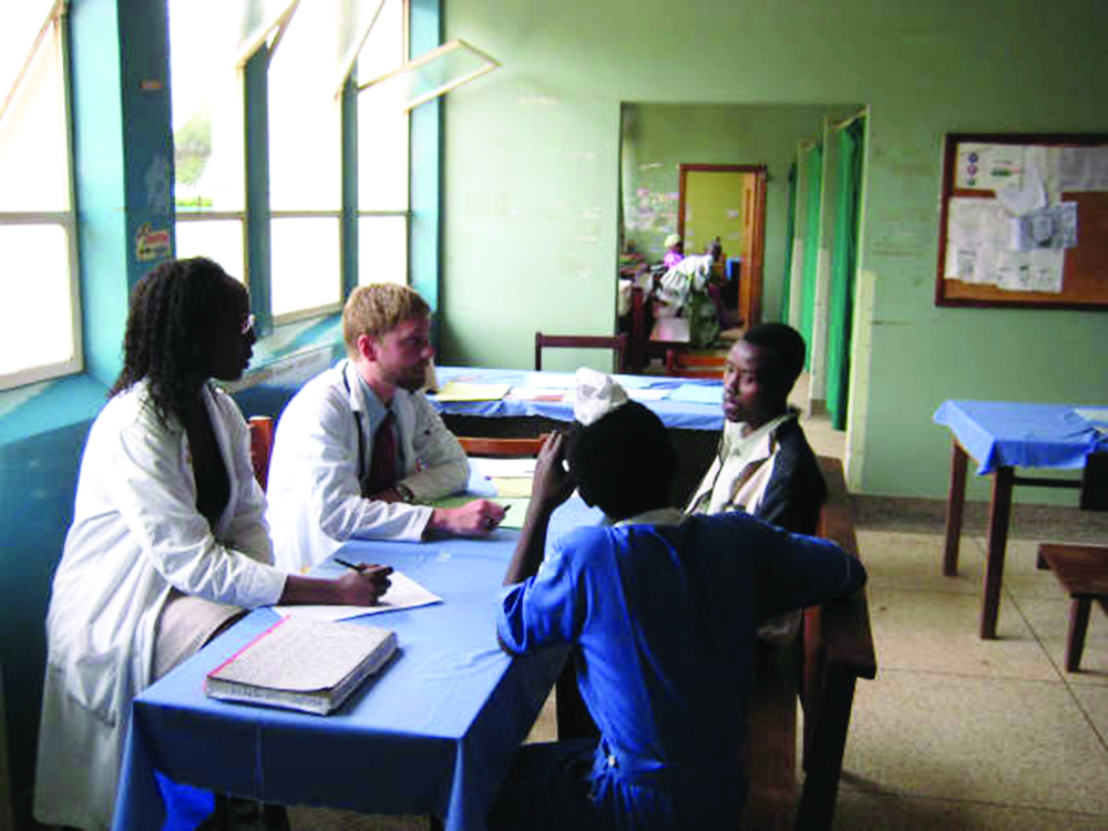 Patient consultation in Uganda (Ana Oton, MD).